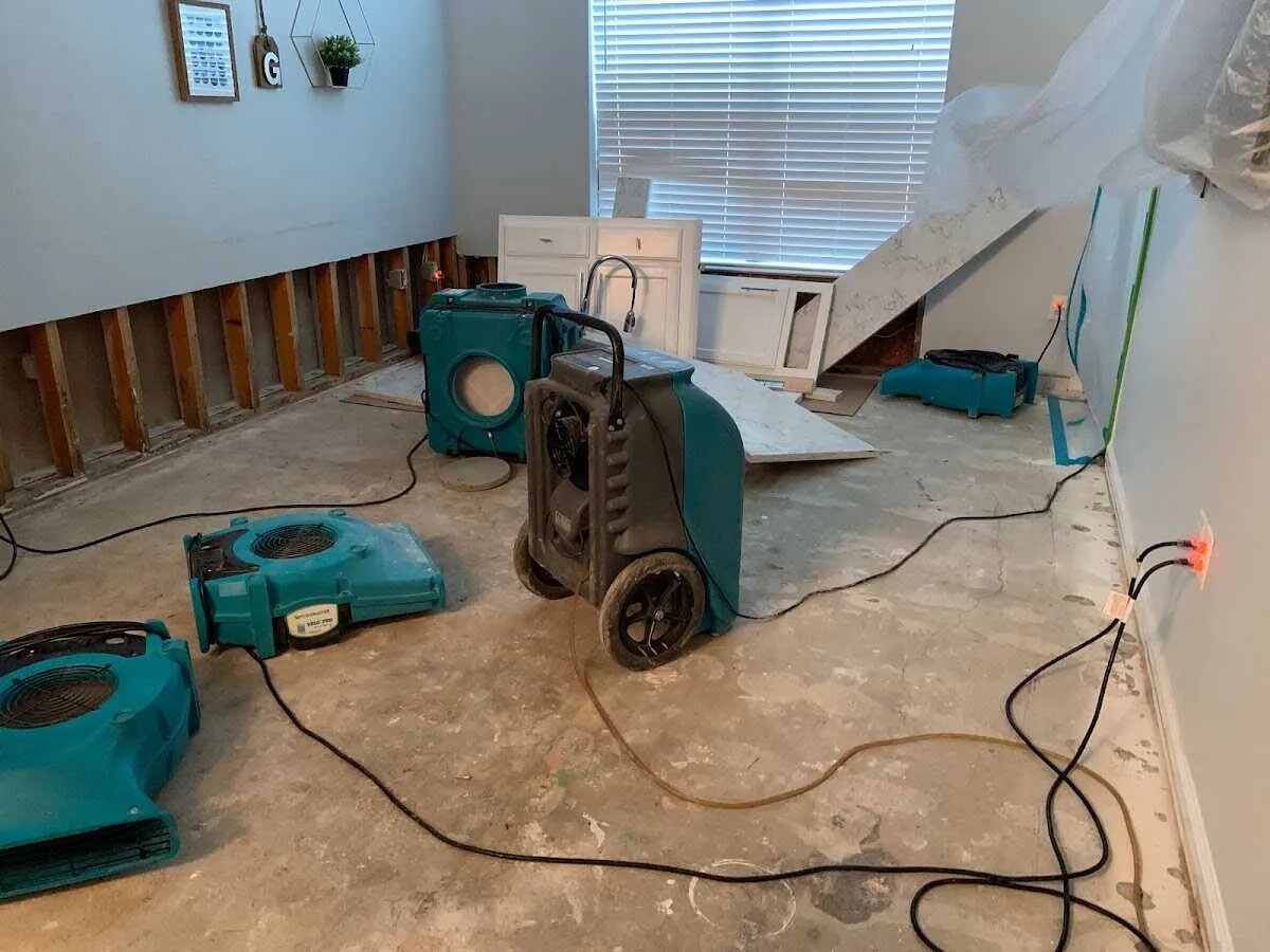 Dehumidifier in flood-cut room for Water Damage Restoration in Tucson